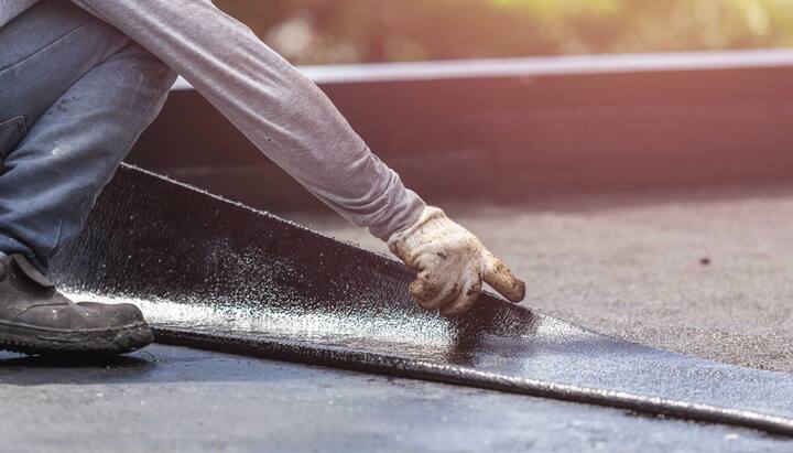 Service experts completing a waterproofing project in Hamilton, NY.